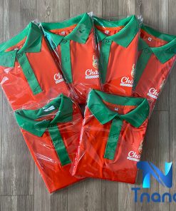 đồng phục áo thun cam cổ xanh - chao ép